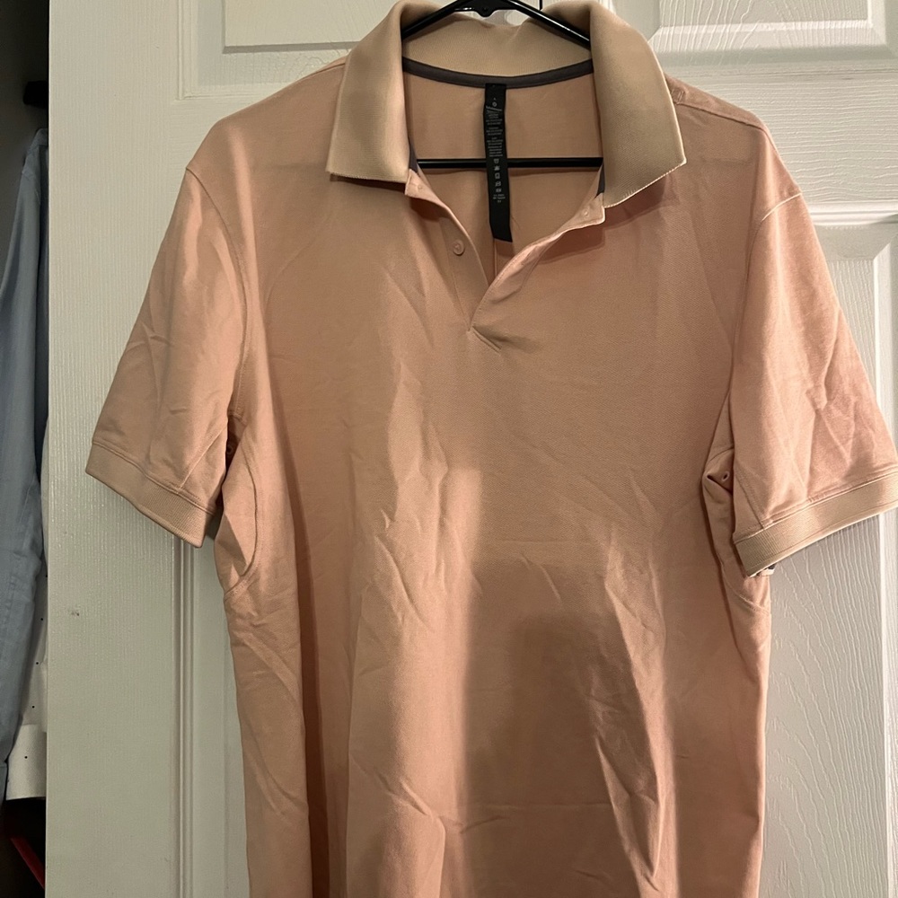 Men’s Lululemon pink polo shirt